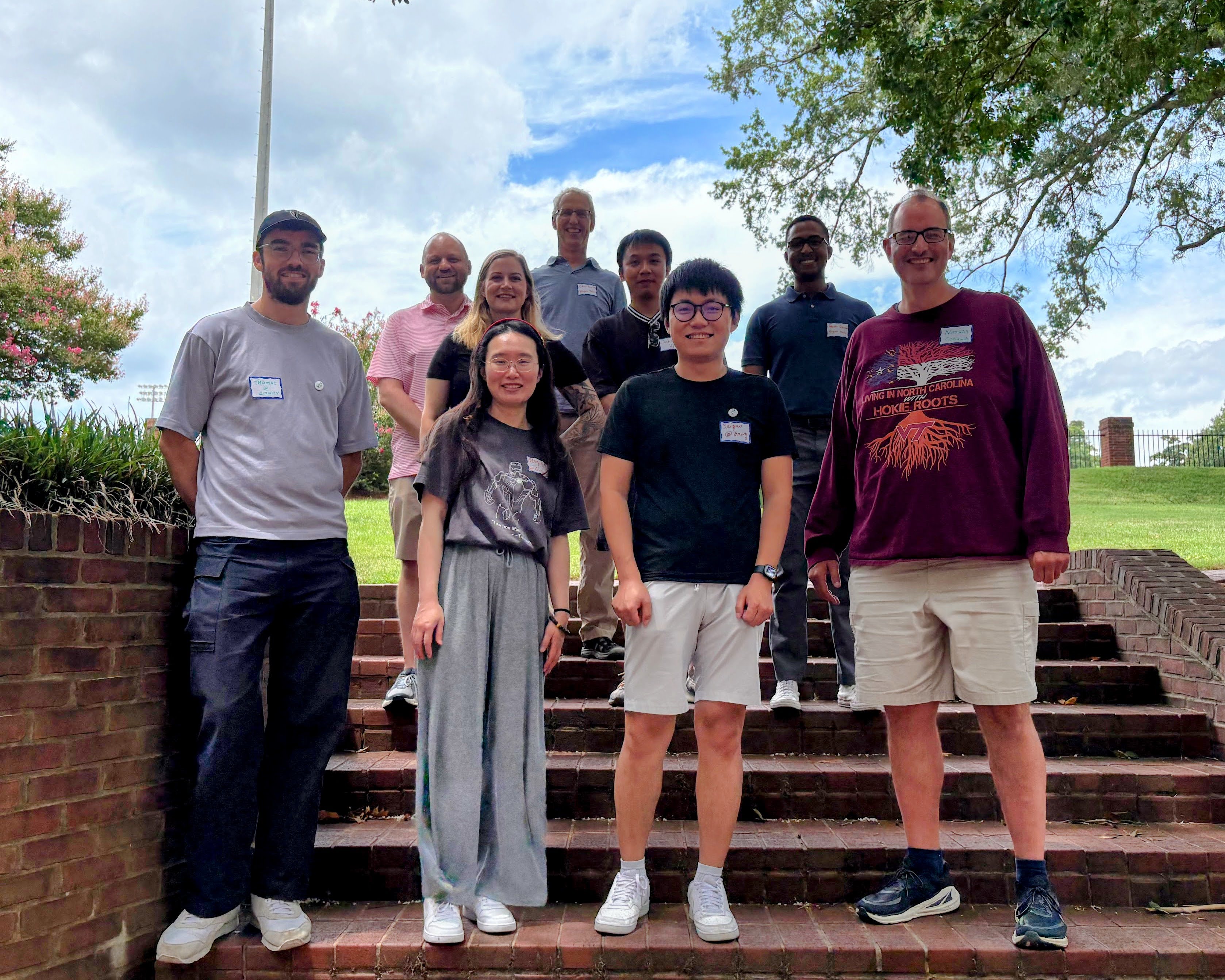 The Chris North academic family, showing 9 people standing brick steps at Davidson College, with Chris North at the top and people he advised and their advisees below.